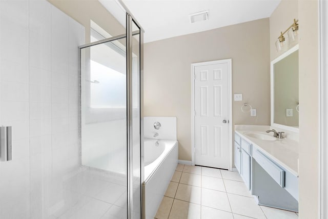bathroom featuring a shower stall, vanity, a bath, tile patterned floors, and visible vents