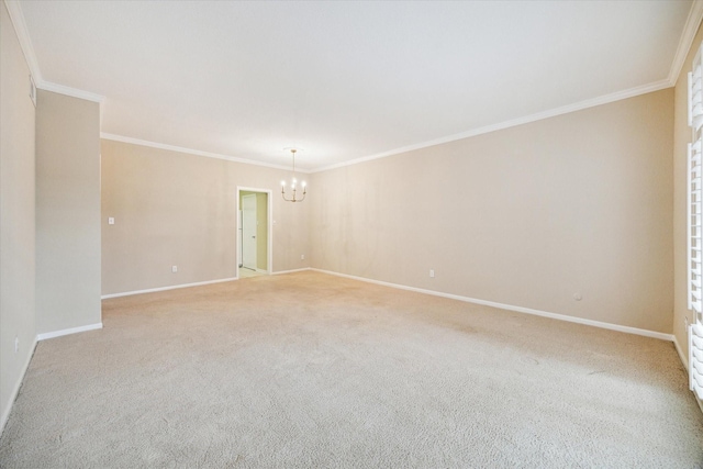 spare room featuring crown molding, light carpet, a chandelier, and baseboards