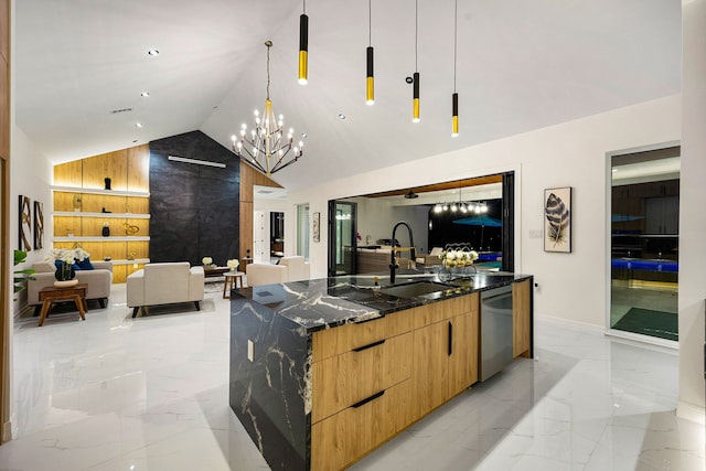 kitchen featuring modern cabinets, stainless steel dishwasher, open floor plan, and marble finish floor