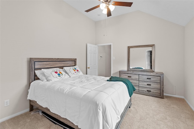 carpeted bedroom featuring high vaulted ceiling, baseboards, and ceiling fan