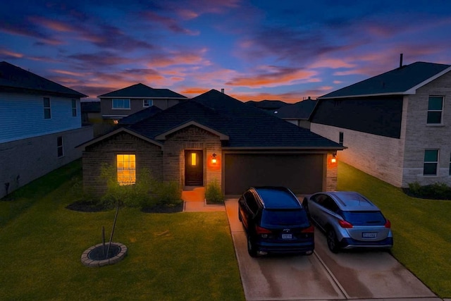 traditional home featuring driveway, a front lawn, and an attached garage
