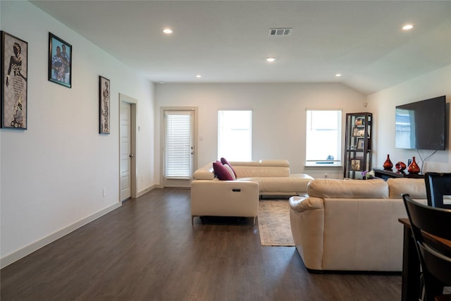 living room with visible vents, recessed lighting, and dark wood-style floors