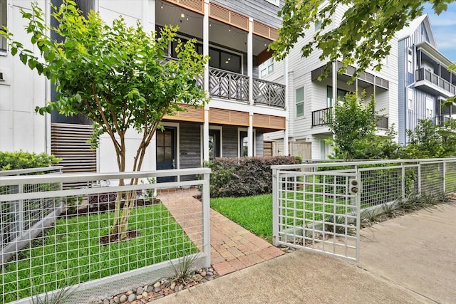 view of building exterior featuring fence
