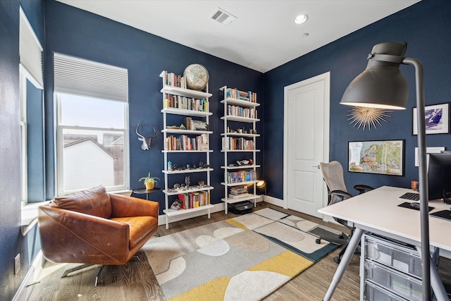 office with wood finished floors, visible vents, recessed lighting, and baseboards