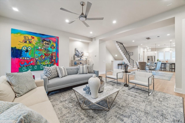 710 E 21st St, Houston, TX 77008 - living area featuring recessed lighting, ceiling fan, stairs, baseboards, and wood finished floors