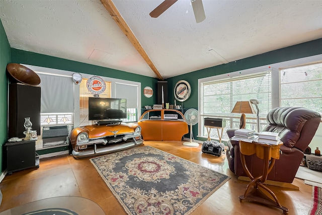 interior space with wood finished floors, lofted ceiling with beams, a textured ceiling, cooling unit, and a ceiling fan