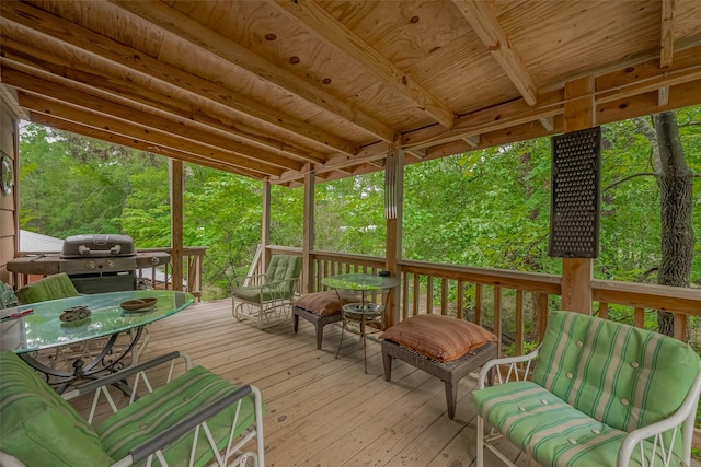 wooden deck with area for grilling