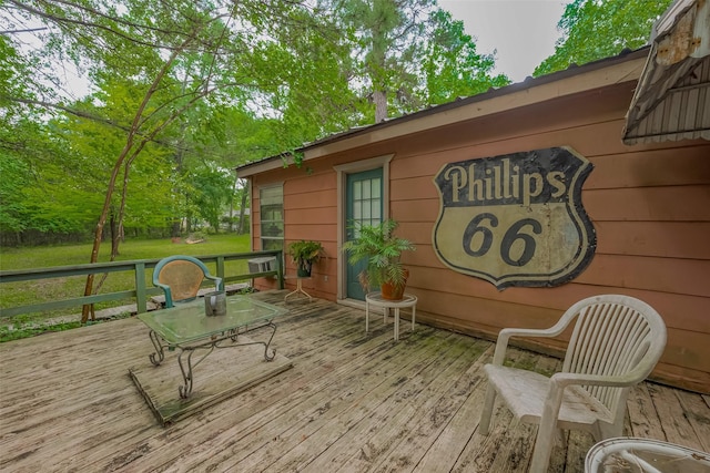 deck featuring a yard