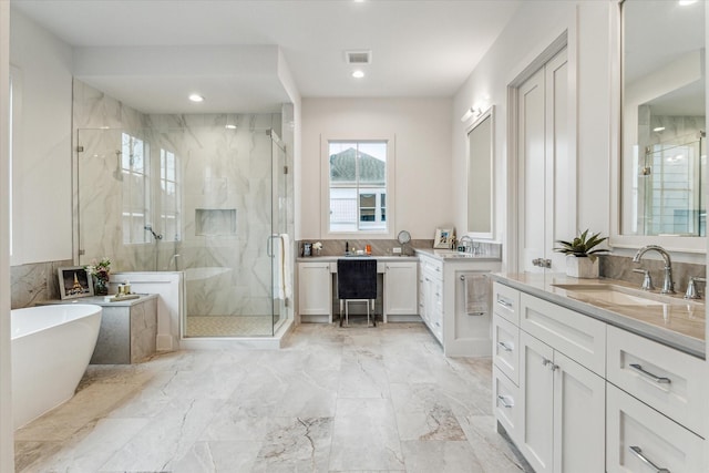 714 E 21st St, Houston, TX 77008 - full bathroom with visible vents, a marble finish shower, and a sink