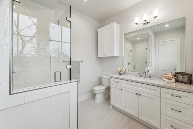 714 E 21st St, Houston, TX 77008 - bathroom featuring a stall shower, baseboards, toilet, recessed lighting, and vanity