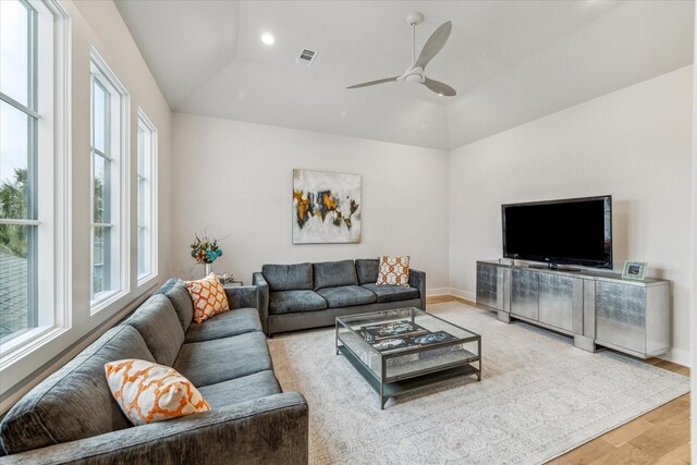 714 E 21st St, Houston, TX 77008 - living room with ceiling fan, lofted ceiling, visible vents, baseboards, and wood finished floors