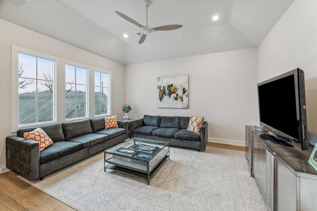 714 E 21st St, Houston, TX 77008 - living area featuring baseboards, ceiling fan, light wood finished floors, and vaulted ceiling