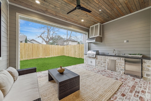 714 E 21st St, Houston, TX 77008 - view of patio / terrace featuring a sink, ceiling fan, a grill, a fenced backyard, and an outdoor kitchen