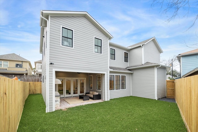 714 E 21st St, Houston, TX 77008 - rear view of property featuring a patio, an outdoor hangout area, a fenced backyard, and a yard