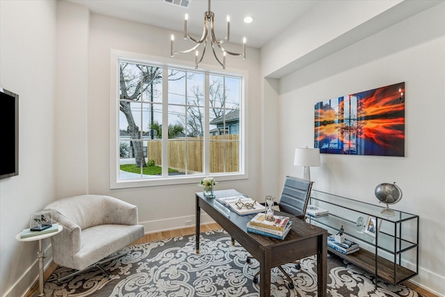 714 E 21st St, Houston, TX 77008 - office featuring visible vents, wood finished floors, a chandelier, and baseboards