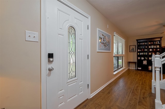 2307 Country Place Dr, Richmond, TX 77406 - foyer with baseboards, a ceiling fan, and dark wood finished floors