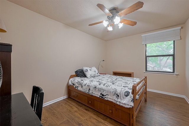 2307 Country Place Dr, Richmond, TX 77406 - bedroom featuring wood finished floors, baseboards, and ceiling fan