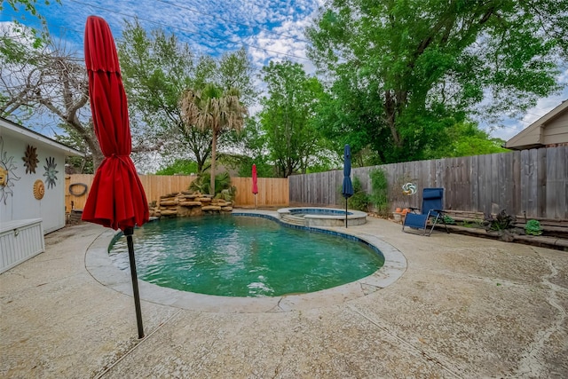 2307 Country Place Dr, Richmond, TX 77406 - view of pool with a fenced backyard, a patio, and a pool with connected hot tub