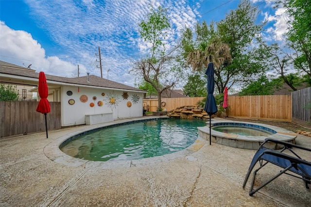 2307 Country Place Dr, Richmond, TX 77406 - view of swimming pool with a fenced backyard, a patio, and a pool with connected hot tub