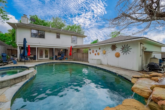 2307 Country Place Dr, Richmond, TX 77406 - rear view of property featuring a chimney, a patio, french doors, and fence
