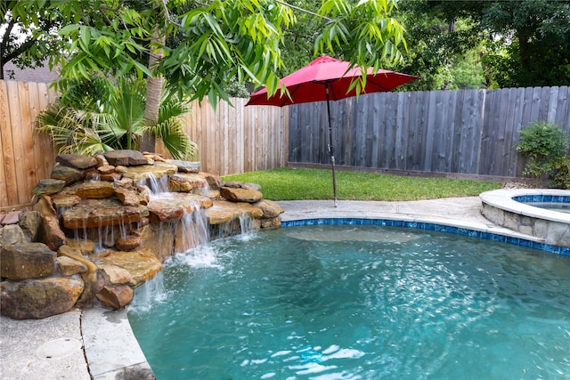 2307 Country Place Dr, Richmond, TX 77406 - view of swimming pool with a fenced backyard, an outdoor hot tub, and a fenced in pool