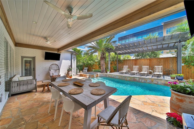 exterior space featuring a fenced backyard, a pergola, ceiling fan, and a pool with connected hot tub