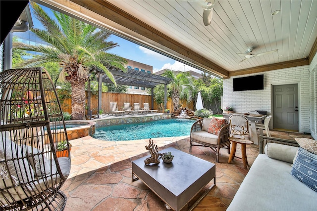 view of swimming pool with a pool with connected hot tub, an outdoor hangout area, a fenced backyard, a patio area, and a ceiling fan