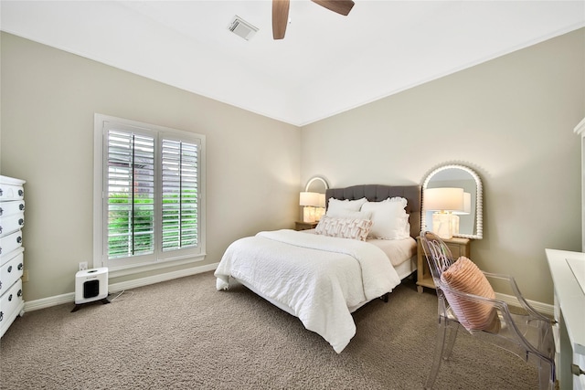carpeted bedroom with baseboards, ceiling fan, and visible vents