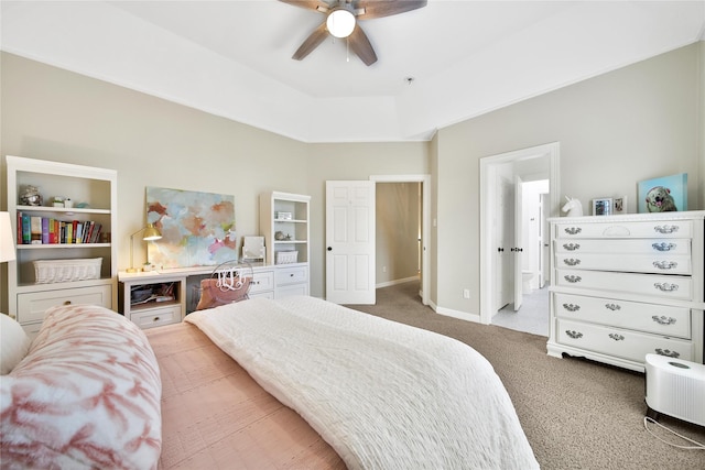 bedroom featuring a ceiling fan, baseboards, and light carpet