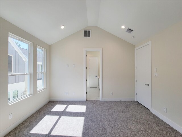 5931 Beall St Unit D, Houston, TX 77091 - interior space featuring lofted ceiling, visible vents, carpet, and baseboards