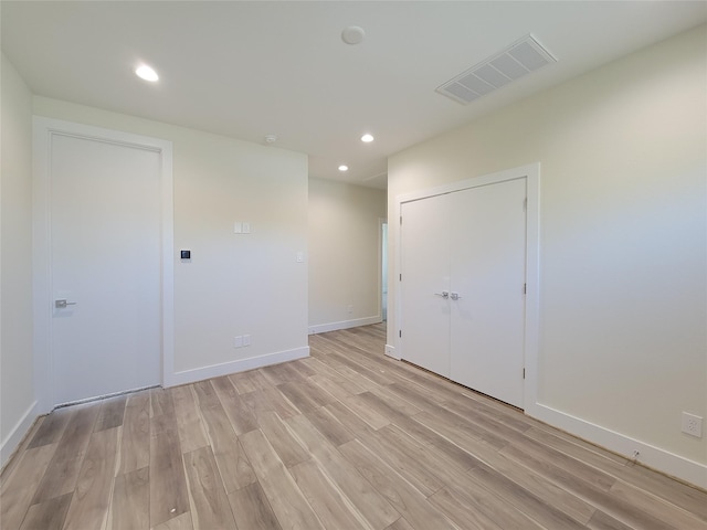5931 Beall St Unit D, Houston, TX 77091 - unfurnished bedroom with visible vents, a closet, baseboards, recessed lighting, and light wood finished floors