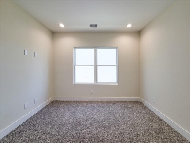 5931 Beall St Unit D, Houston, TX 77091 - carpeted spare room with baseboards, visible vents, and recessed lighting
