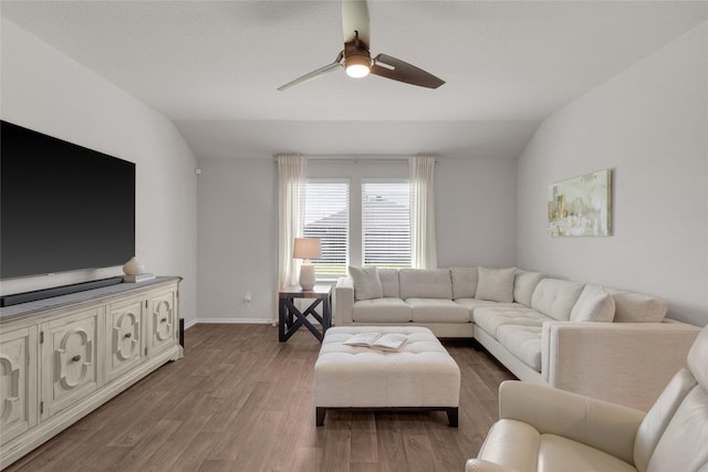 18320 Klamath Falls Ln, New Caney, TX 77357 - living room with lofted ceiling, a ceiling fan, and light wood-type flooring