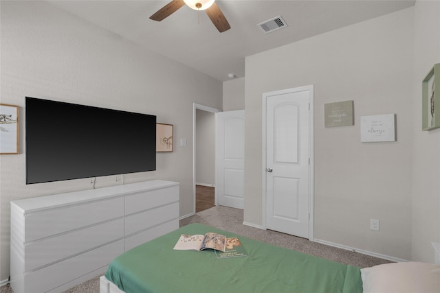 18320 Klamath Falls Ln, New Caney, TX 77357 - carpeted bedroom with baseboards and ceiling fan