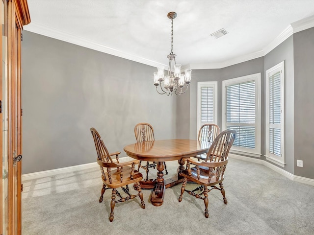 dining area with a notable chandelier, visible vents, carpet, and a healthy amount of sunlight