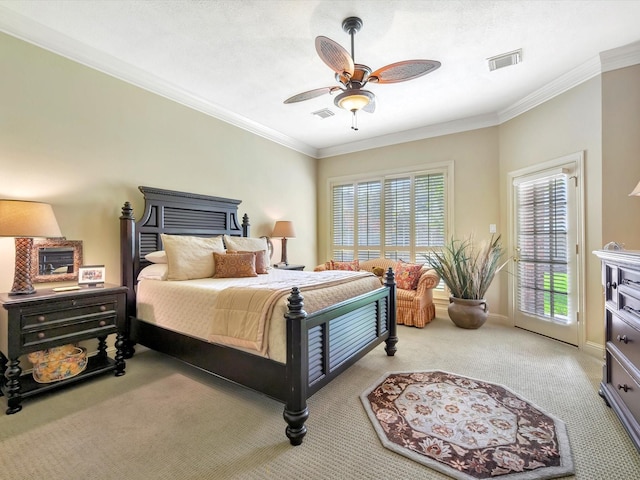bedroom featuring visible vents, ornamental molding, carpet flooring, and access to outside