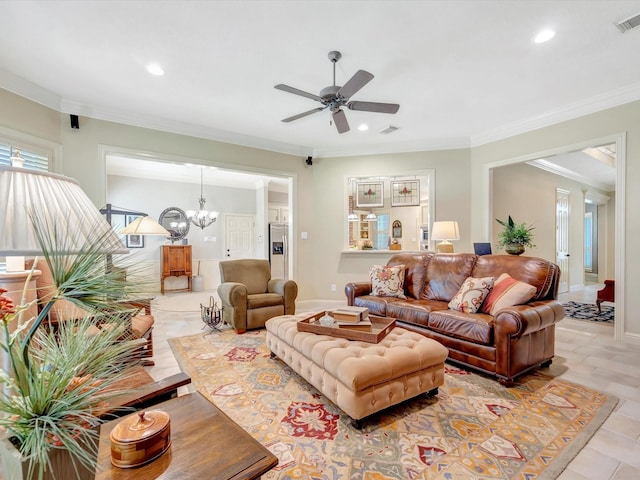 living area with visible vents, baseboards, recessed lighting, ornamental molding, and ceiling fan with notable chandelier