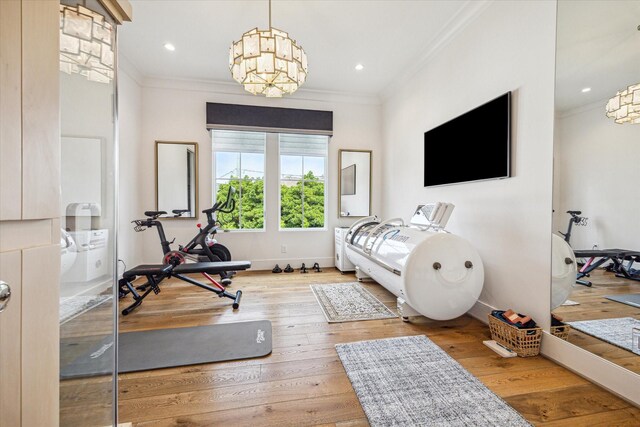 bedroom with hardwood / wood-style floors, crown molding, recessed lighting, and baseboards