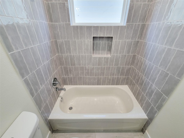 5931 Beall St A-B, Unit A-B Houston, TX 77091 - bathroom with washtub / shower combination and toilet