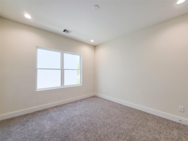 5931 Beall St A-B, Unit A-B Houston, TX 77091 - empty room with carpet, visible vents, recessed lighting, and baseboards