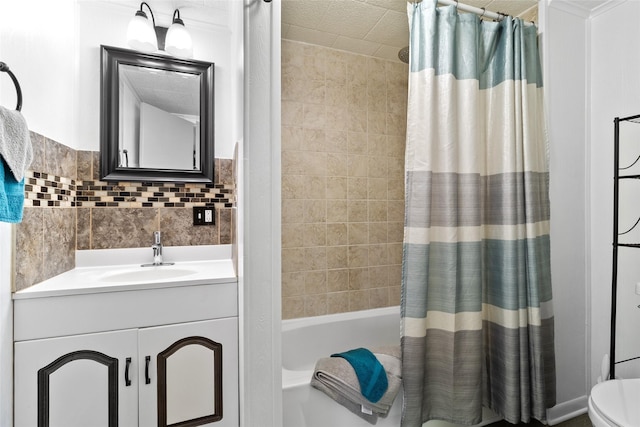 bathroom featuring shower / bath combination with curtain, toilet, and vanity