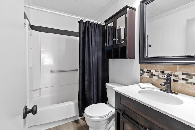 bathroom with a textured ceiling, tasteful backsplash, shower / bath combo with shower curtain, toilet, and vanity