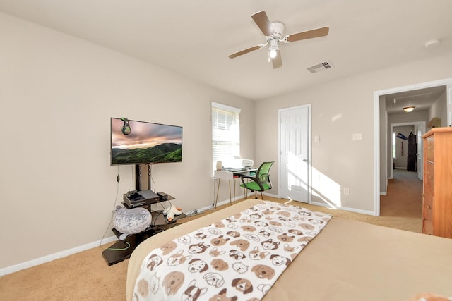 bedroom featuring a ceiling fan, baseboards, visible vents, and carpet