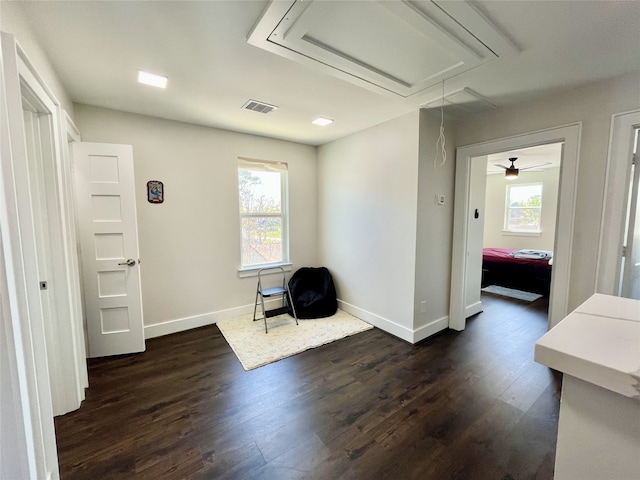 13505 Orleans St, Houston, TX 77015 - sitting room with attic access, dark wood-type flooring, and baseboards