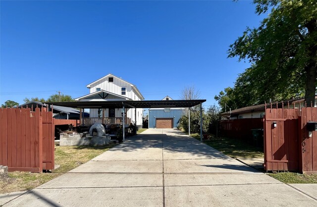 13505 Orleans St, Houston, TX 77015 - view of front of home with an outdoor structure and concrete driveway