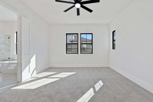 unfurnished bedroom featuring baseboards, ceiling fan, and carpet flooring
