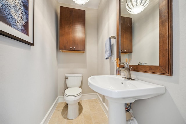 1946 Vermont St, Houston, TX 77019 - bathroom featuring baseboards, toilet, and tile patterned floors