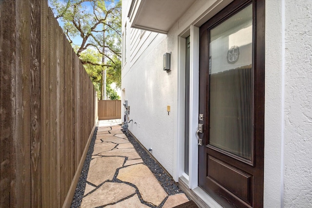 1946 Vermont St, Houston, TX 77019 - view of exterior entry featuring fence and stucco siding
