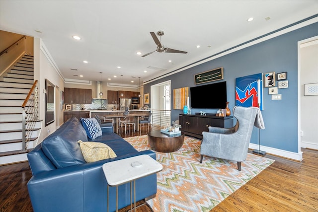 1946 Vermont St, Houston, TX 77019 - living room featuring stairway, ceiling fan, wood finished floors, recessed lighting, and ornamental molding