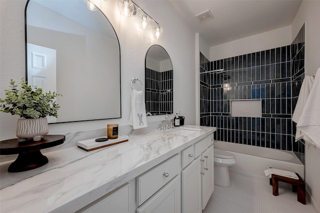 bathroom with vanity, shower / bathing tub combination, toilet, visible vents, and tile patterned flooring